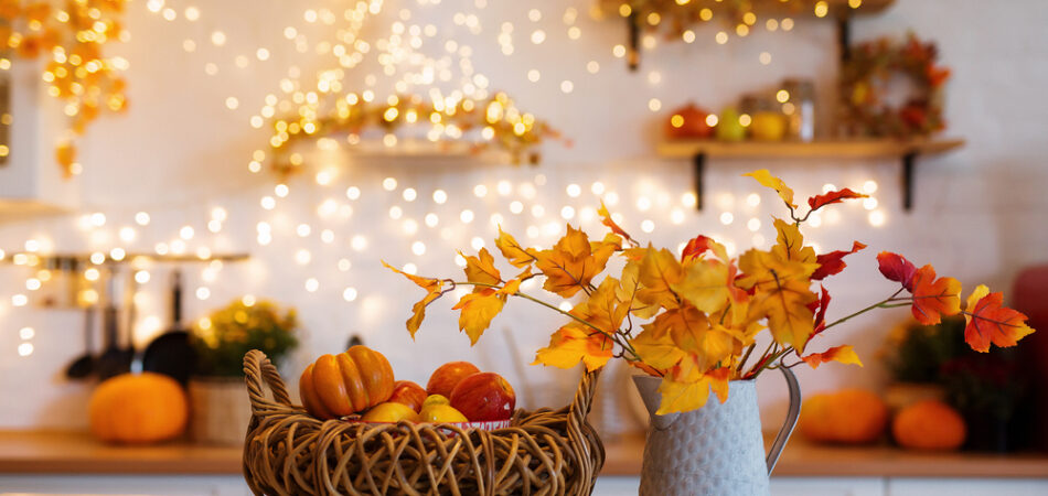 Autumn,kitchen,interior.,red,and,yellow,leaves,and,flowers,in